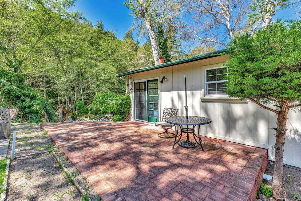 2 Camp Steffani Carmel Valley, CA 93924 - Photo 32 of 45 a view of a backyard with a large tree