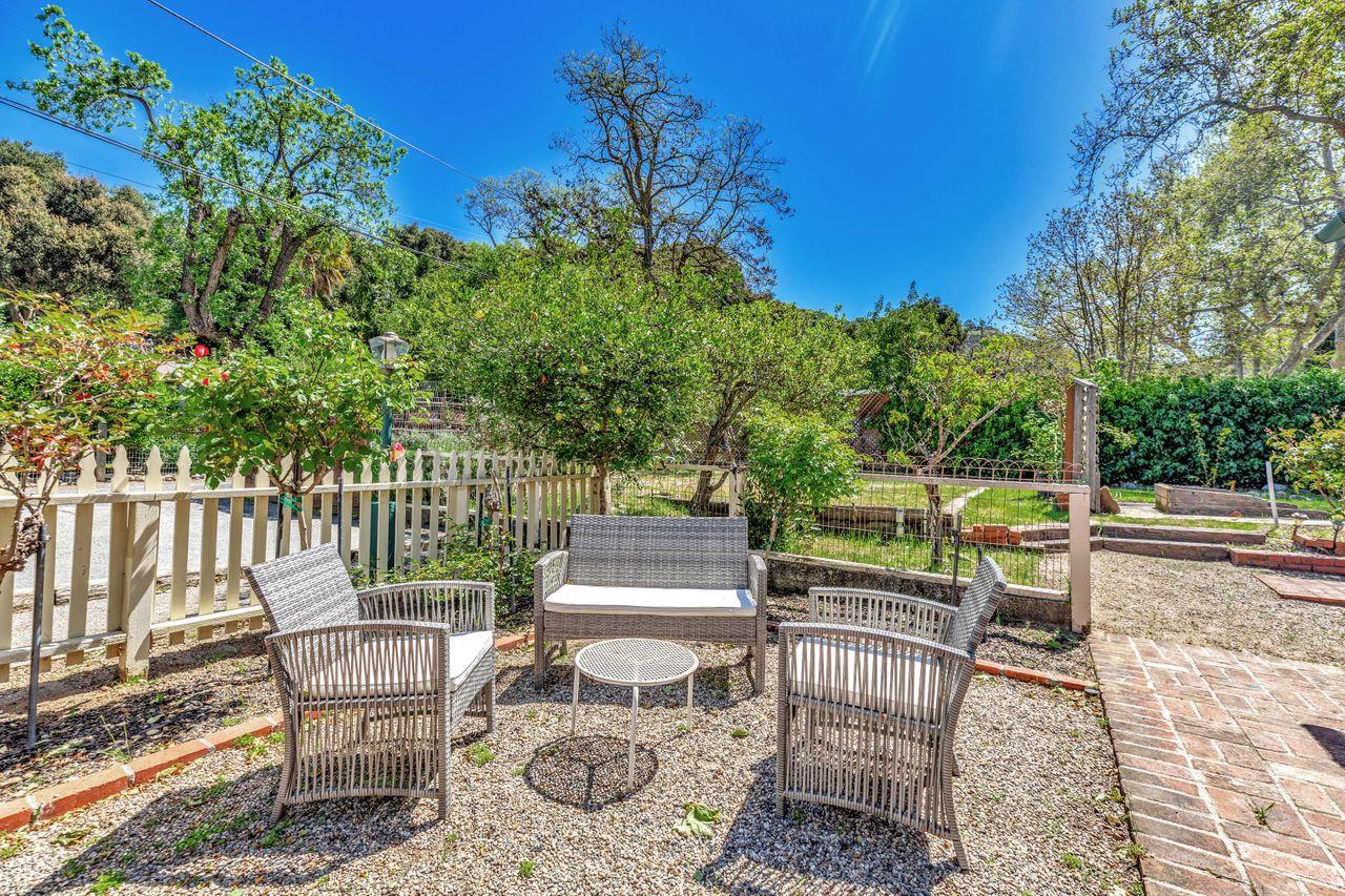 2 Camp Steffani Carmel Valley, CA 93924 - Photo 5 of 45 a view of a patio with a table and chairs