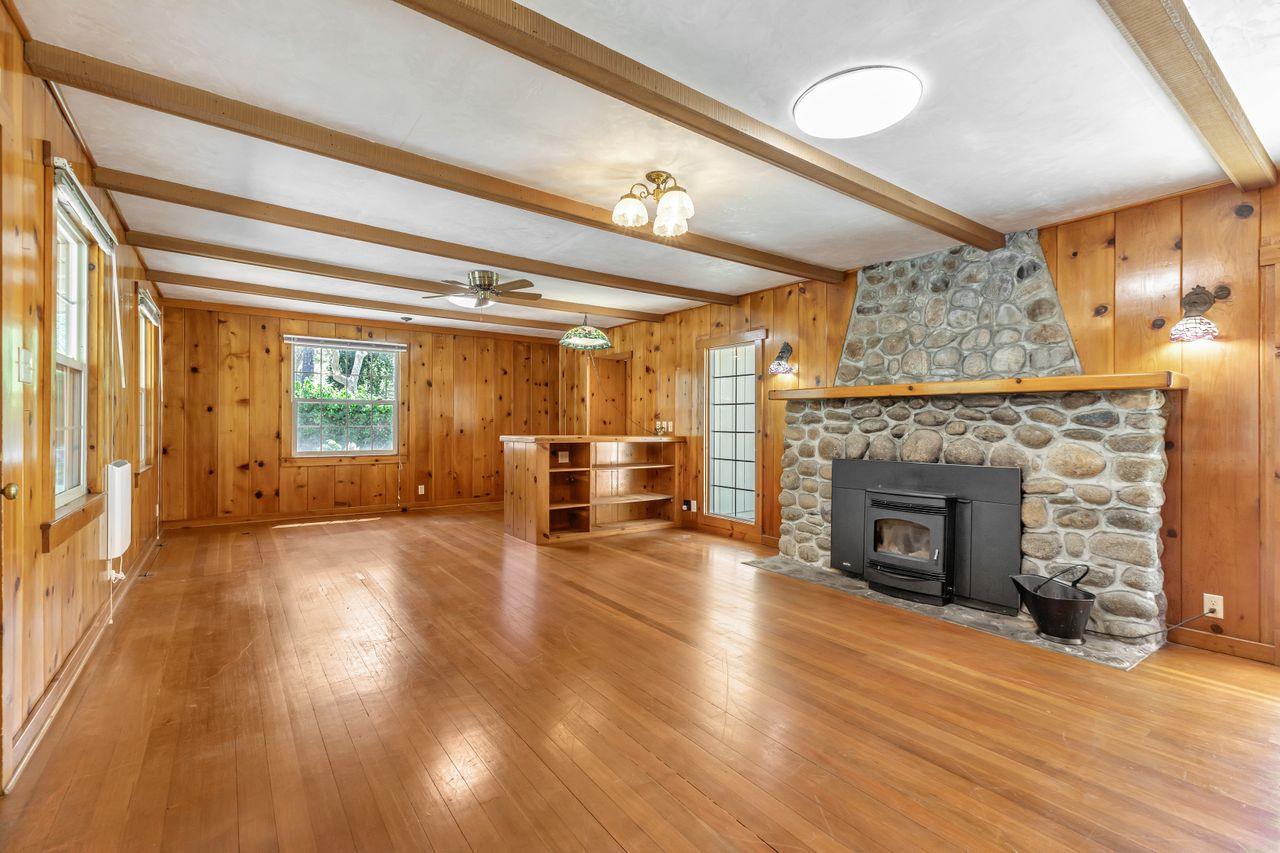 2 Camp Steffani Carmel Valley, CA 93924 - Photo 9 of 45 a view of a livingroom with wooden floor a fireplace and window