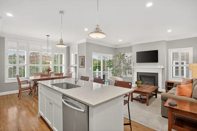 a view of living room with furniture and fireplace