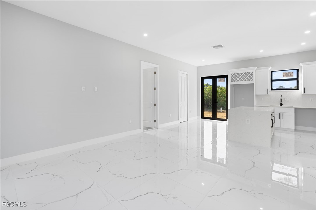 2603 3rd Street Southwest Lehigh Acres, FL 33976 - Photo 12 of 28 a view of an empty room