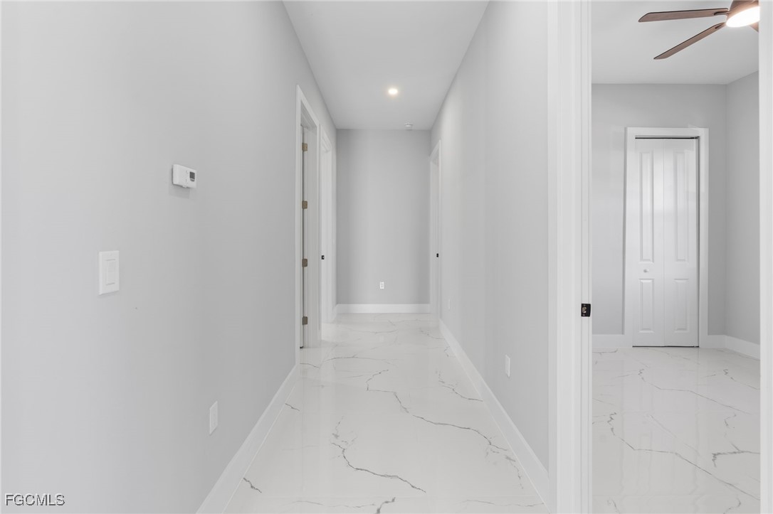 2603 3rd Street Southwest Lehigh Acres, FL 33976 - Photo 15 of 28 a view of a hallway