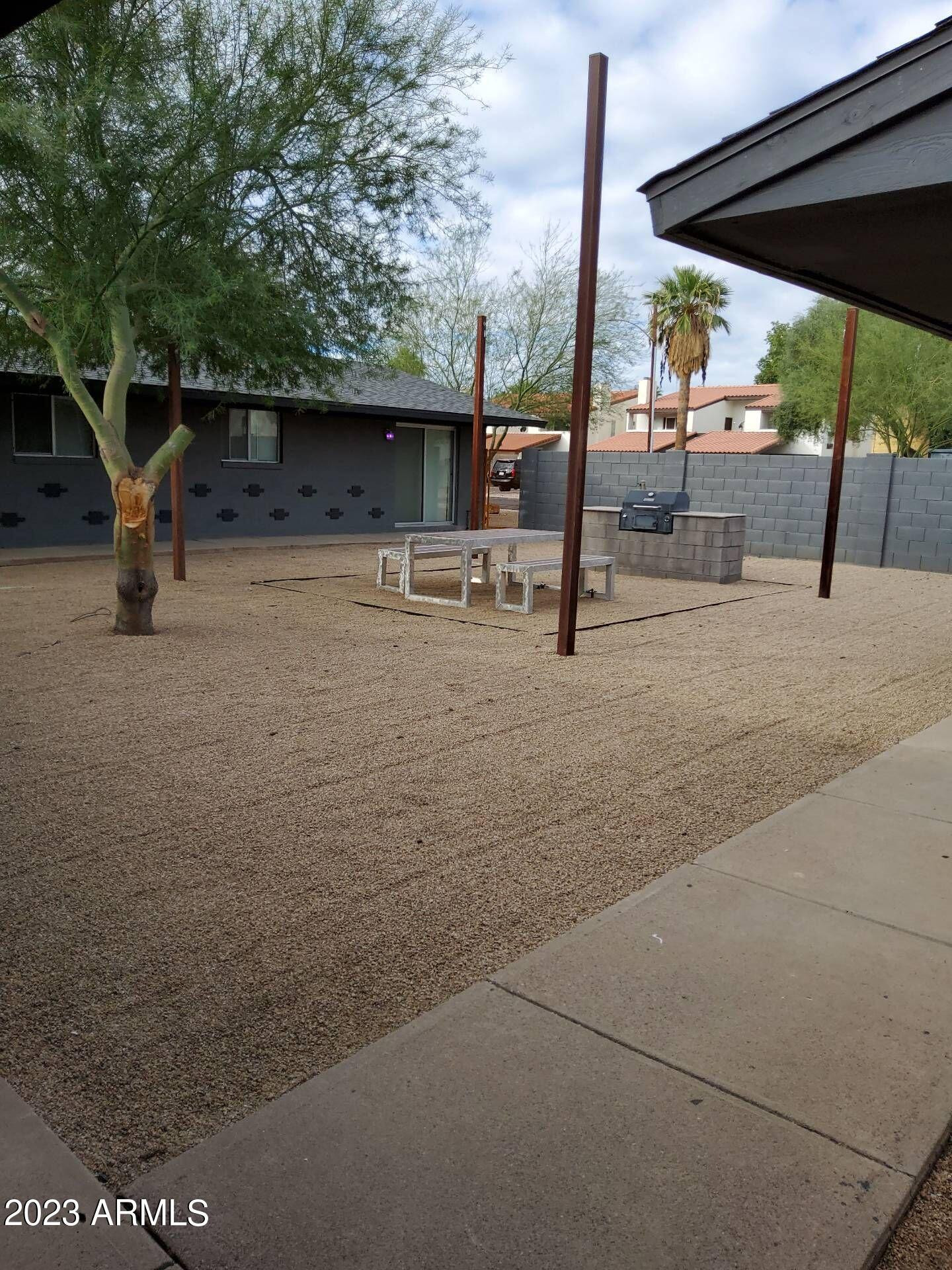 3427 North 12th Place, Unit 1 Phoenix, AZ 85014 - Photo 1 of 7 a view of outdoor space with seating