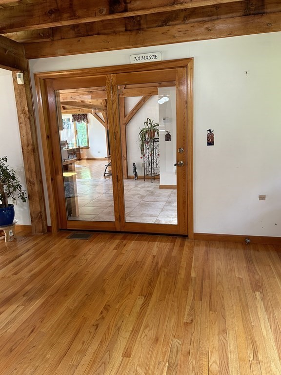 59 Paradise Lake Road Monson, MA 01057 - Photo 14 of 30 a view of a glass door with wooden floor
