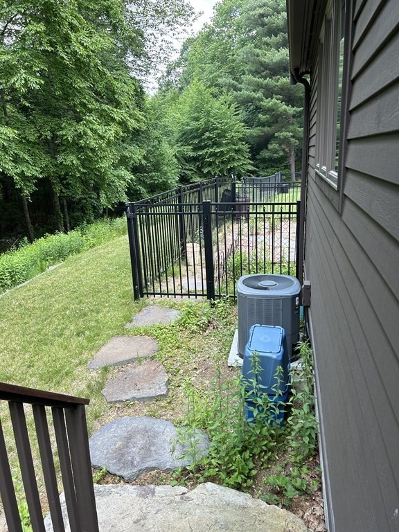 59 Paradise Lake Road Monson, MA 01057 - Photo 2 of 30 a view of a backyard with a garden