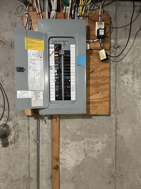 59 Paradise Lake Road Monson, MA 01057 - Photo 26 of 30 a front view of a house with a blue gate