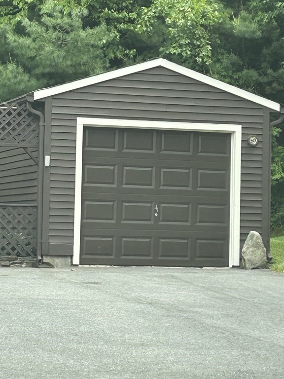 59 Paradise Lake Road Monson, MA 01057 - Photo 5 of 30 a side view of a house
