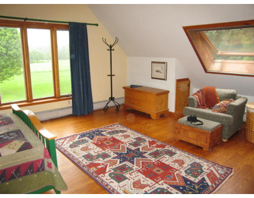 582 Pfersick Road Ashfield, MA 01370 - Photo 13 of 23 a bedroom with furniture and a window