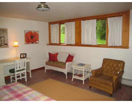 582 Pfersick Road Ashfield, MA 01370 - Photo 16 of 23 a living room with furniture and a window