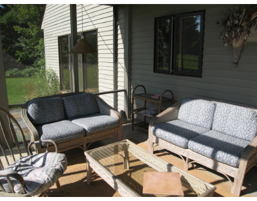 582 Pfersick Road Ashfield, MA 01370 - Photo 3 of 23 a balcony with furniture and a potted plant