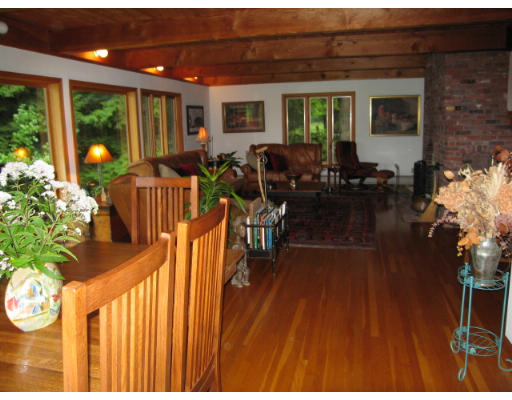 582 Pfersick Road Ashfield, MA 01370 - Photo 4 of 23 a living room with furniture a potted plant and a large window