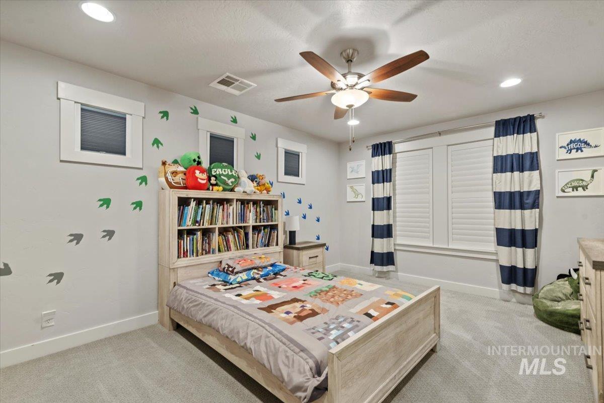 2616 West Neff Street Boise, ID 83702 - Photo 23 of 36 Bedroom with recessed lighting, light colored carpet, and ceiling fan