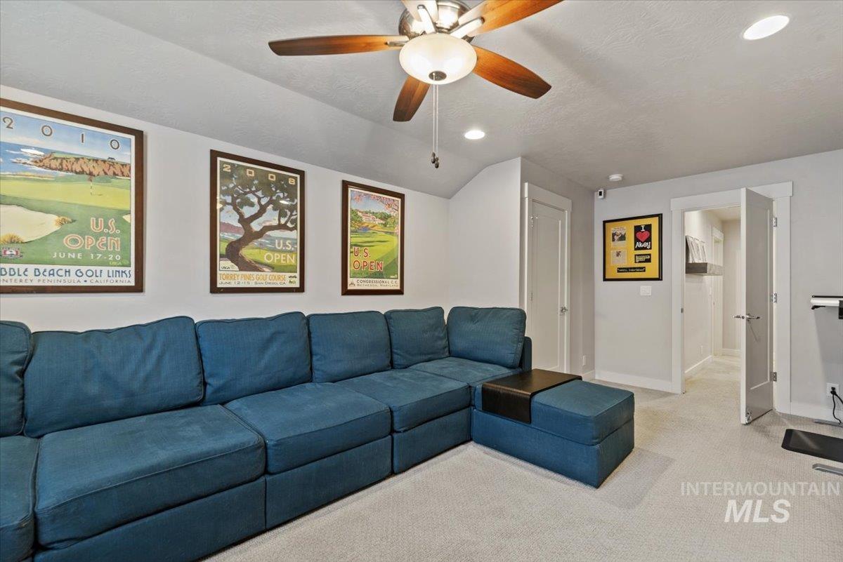 2616 West Neff Street Boise, ID 83702 - Photo 30 of 36 Carpeted living room with ceiling fan and recessed lighting