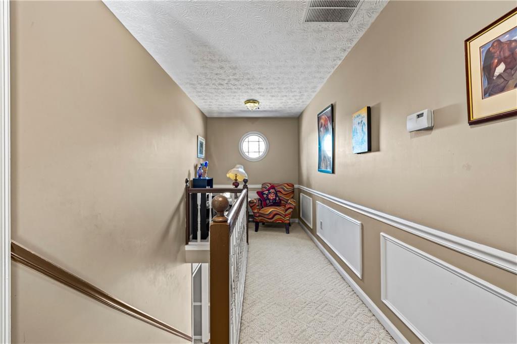 1500 Lake Dow Road McDonough, GA 30252 - Photo 16 of 42 a view of a hallway with workspace