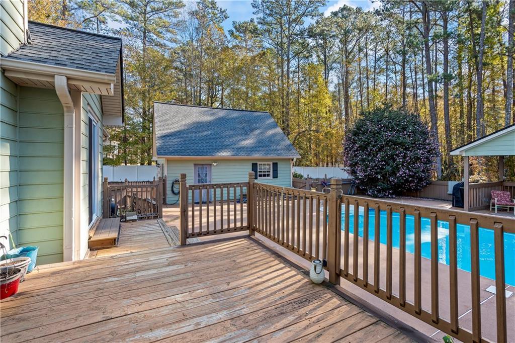 1500 Lake Dow Road McDonough, GA 30252 - Photo 27 of 42 a view of a wooden house and a yard