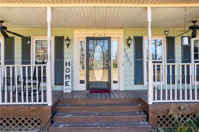 a front view of a house with a porch