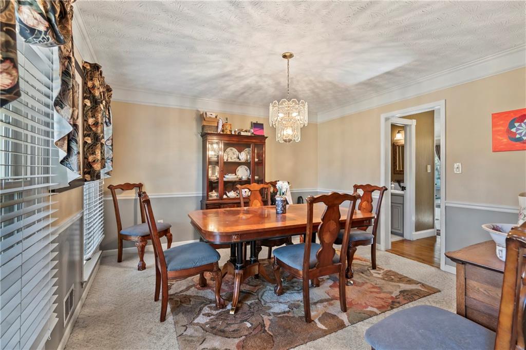 1500 Lake Dow Road McDonough, GA 30252 - Photo 7 of 42 a view of a dining room with furniture