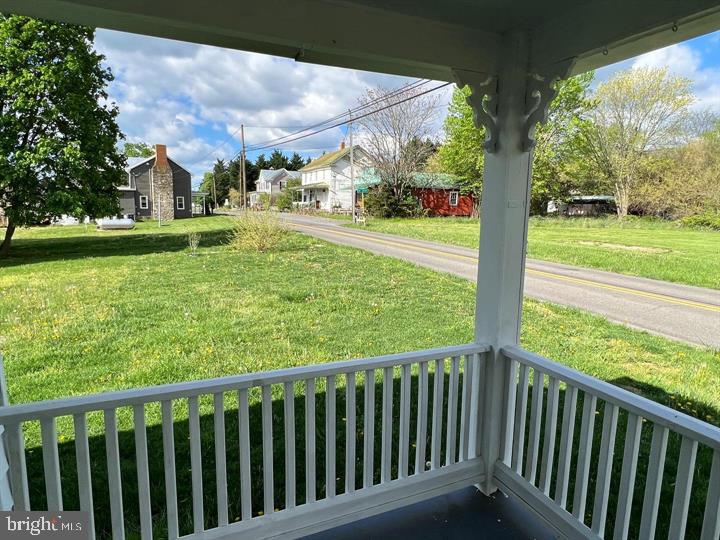 12392 Back Road Toms Brook, VA 22660 - Photo 2 of 15 a view of balcony with yard