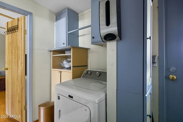 a view of street from balcony