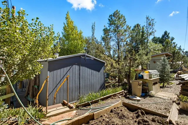 a view of a backyard of the house