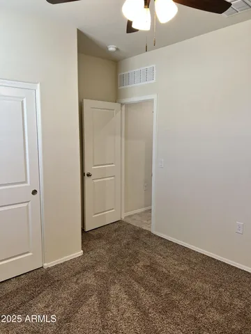 a view of a swimming pool with a yard