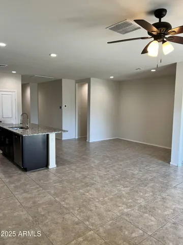 a view of a kitchen with a sink