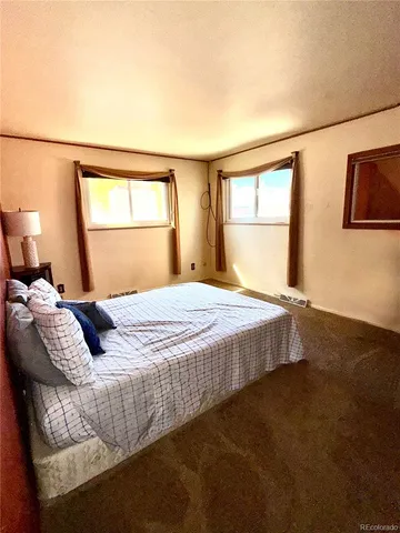 a bathroom with a sink vanity and a mirror