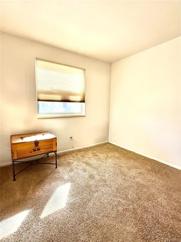 an empty room with window