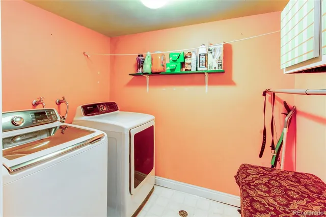 a view of a big room with closet and wooden door