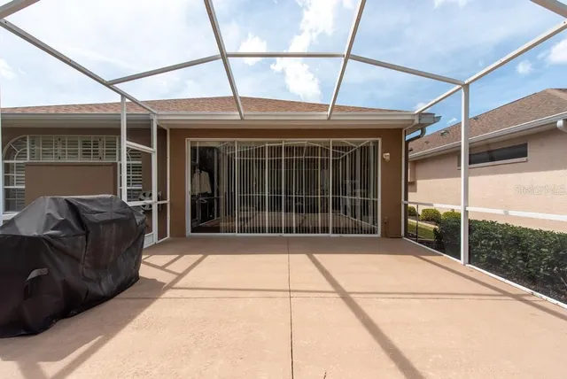 a view of a house with a large window