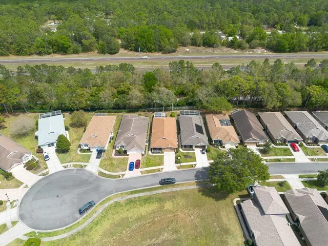 swimming pool view with a outdoor seating space