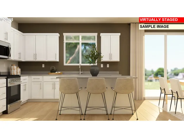 a open kitchen with granite countertop a stove a sink and white cabinets with wooden floor