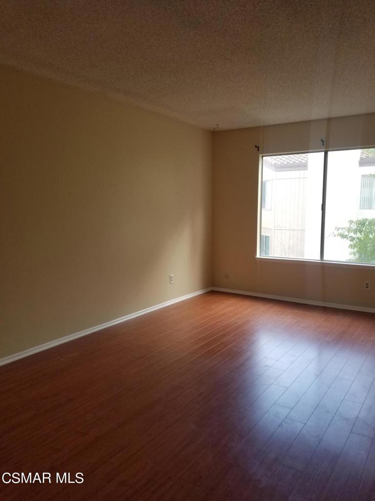 1754 Sinaloa Road, Unit 275 Simi Valley, CA 93065 - Photo 12 of 18 an empty room with a window