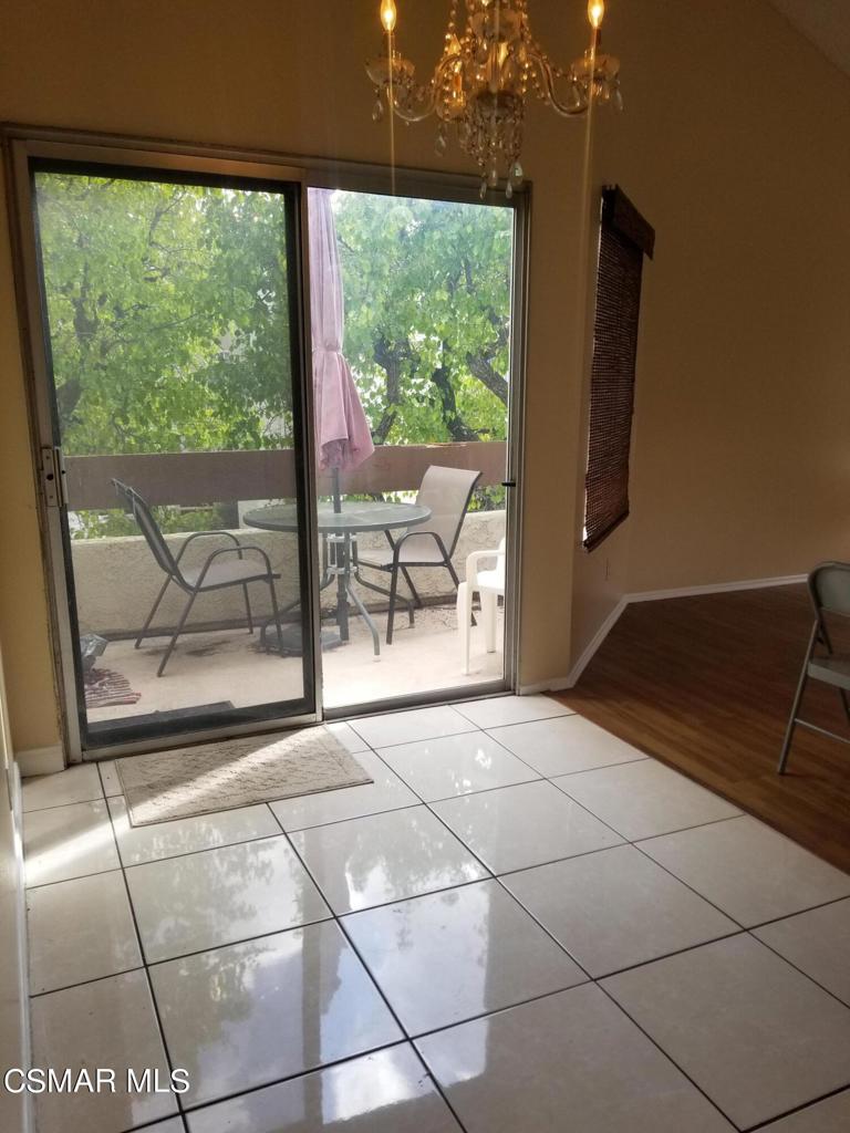1754 Sinaloa Road, Unit 275 Simi Valley, CA 93065 - Photo 8 of 18 a view of a room with wooden floor and outdoor space