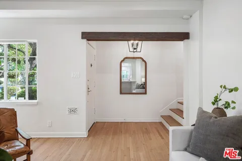 a view of livingroom with furniture and wooden floor