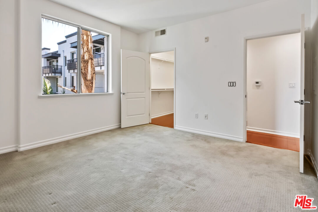 629 Traction Avenue, Unit 507 Los Angeles, CA 90013 - Photo 16 of 52 a view of an empty room with a window