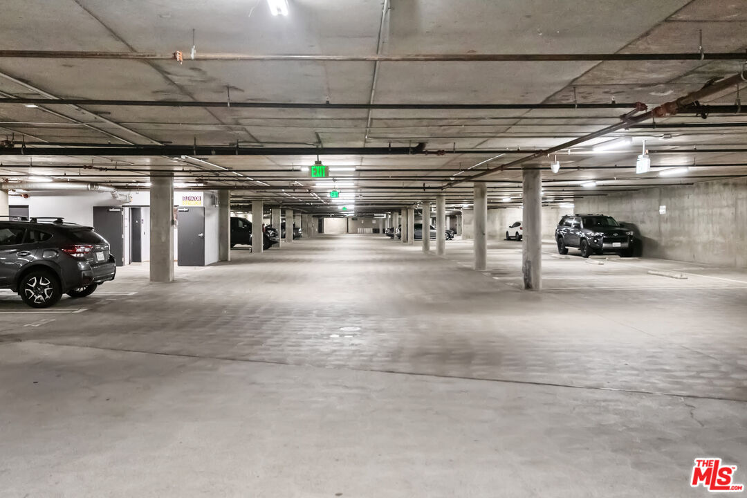 629 Traction Avenue, Unit 507 Los Angeles, CA 90013 - Photo 49 of 52 a view of parking garage with cars