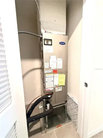 a bathroom with a granite countertop toilet a sink and bathtub