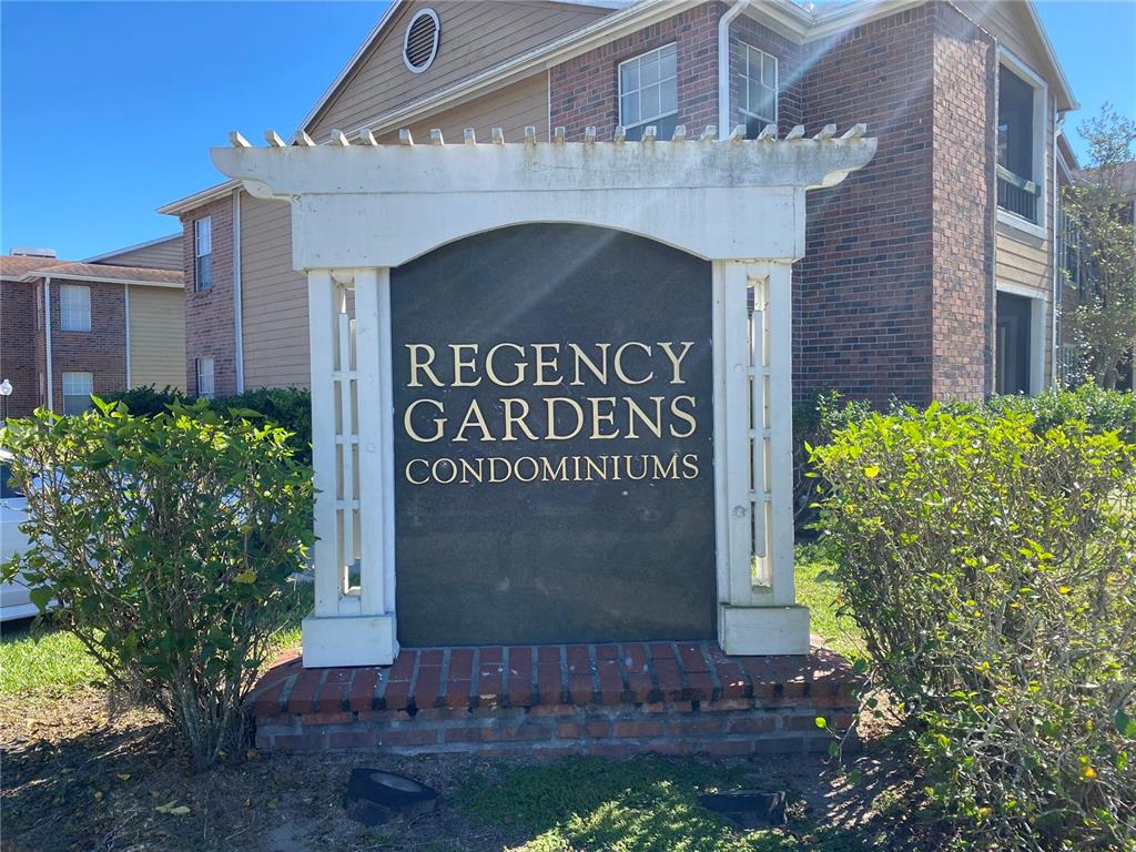 5500 Devonbriar Way, Unit 203 Orlando, FL 32822 - Photo 1 of 1 a sign on the side of a building