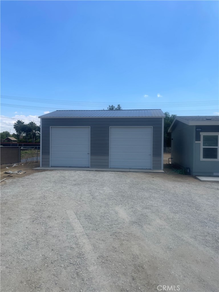 19165 Spalding Avenue Riverside, CA 92508 - Photo 5 of 32 Brand New Detached Steel Garage just added. three 12 foot doors. Two in Front One in rear.