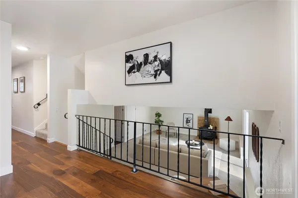 a view of a hallway with windows