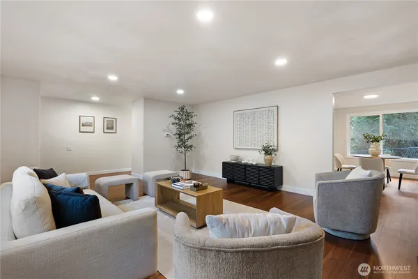 a living room with furniture and a table