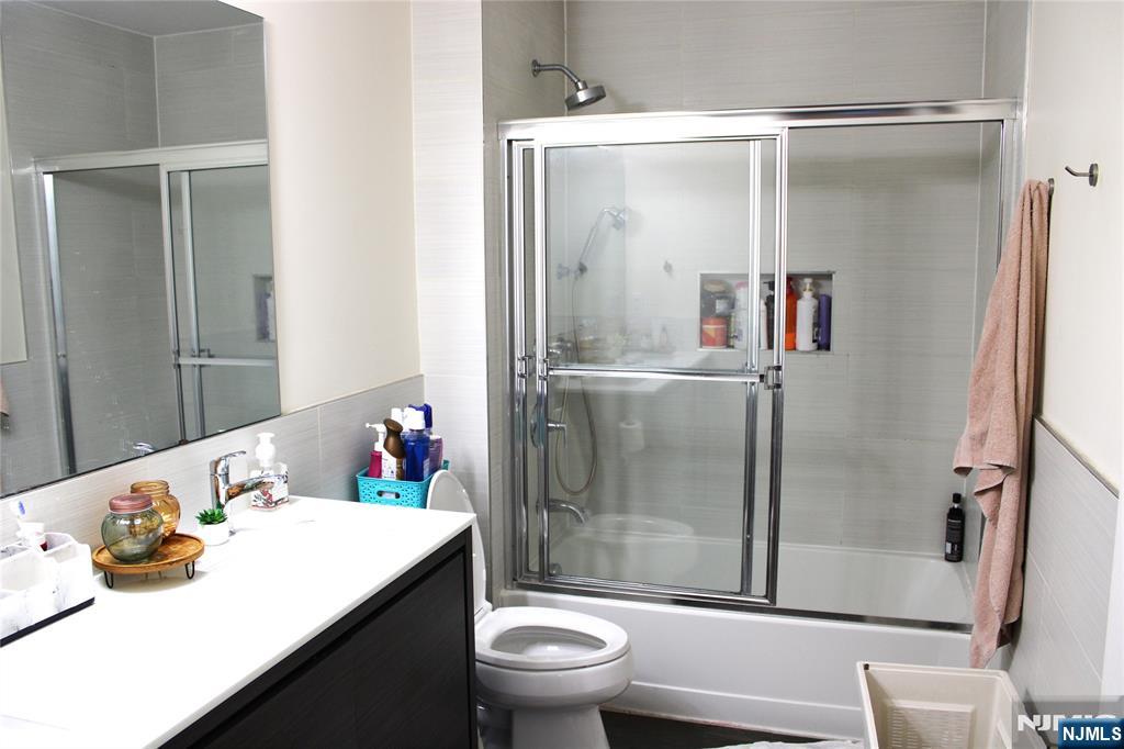 294-296 Tenafly Road Tenafly, NJ 07670 - Photo 21 of 24 a bathroom with a sink toilet and shower