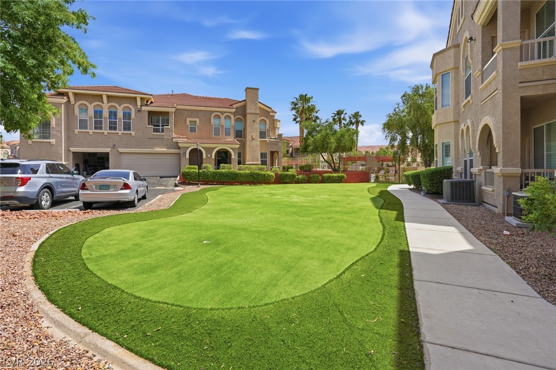 10550 West Alexander Road, Unit 2177 Las Vegas, NV 89129 - Photo 16 of 19 This residence features a well-maintained putting green, offering leisure right at your doorstep.