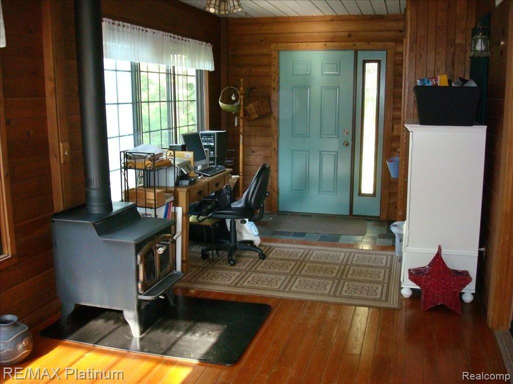 2273 Pleasant Ridge Howell, MI 48843 - Photo 7 of 16 Family Room w/ Wood Burner
