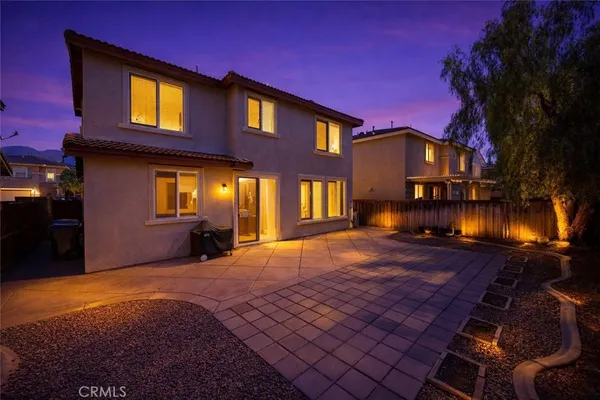 a view of a house with a patio