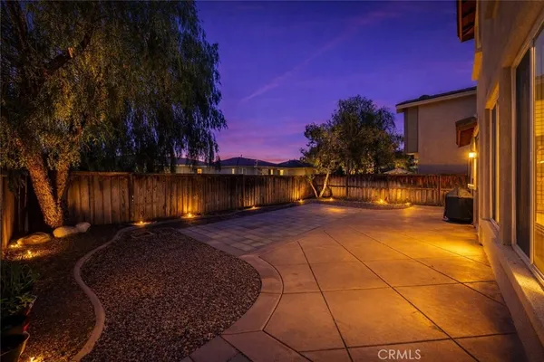 a view of a yard with an outdoor space