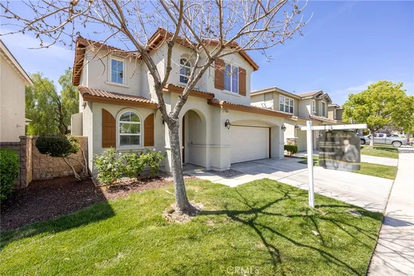 a house view with a outdoor space