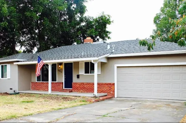 a front view of house with yard