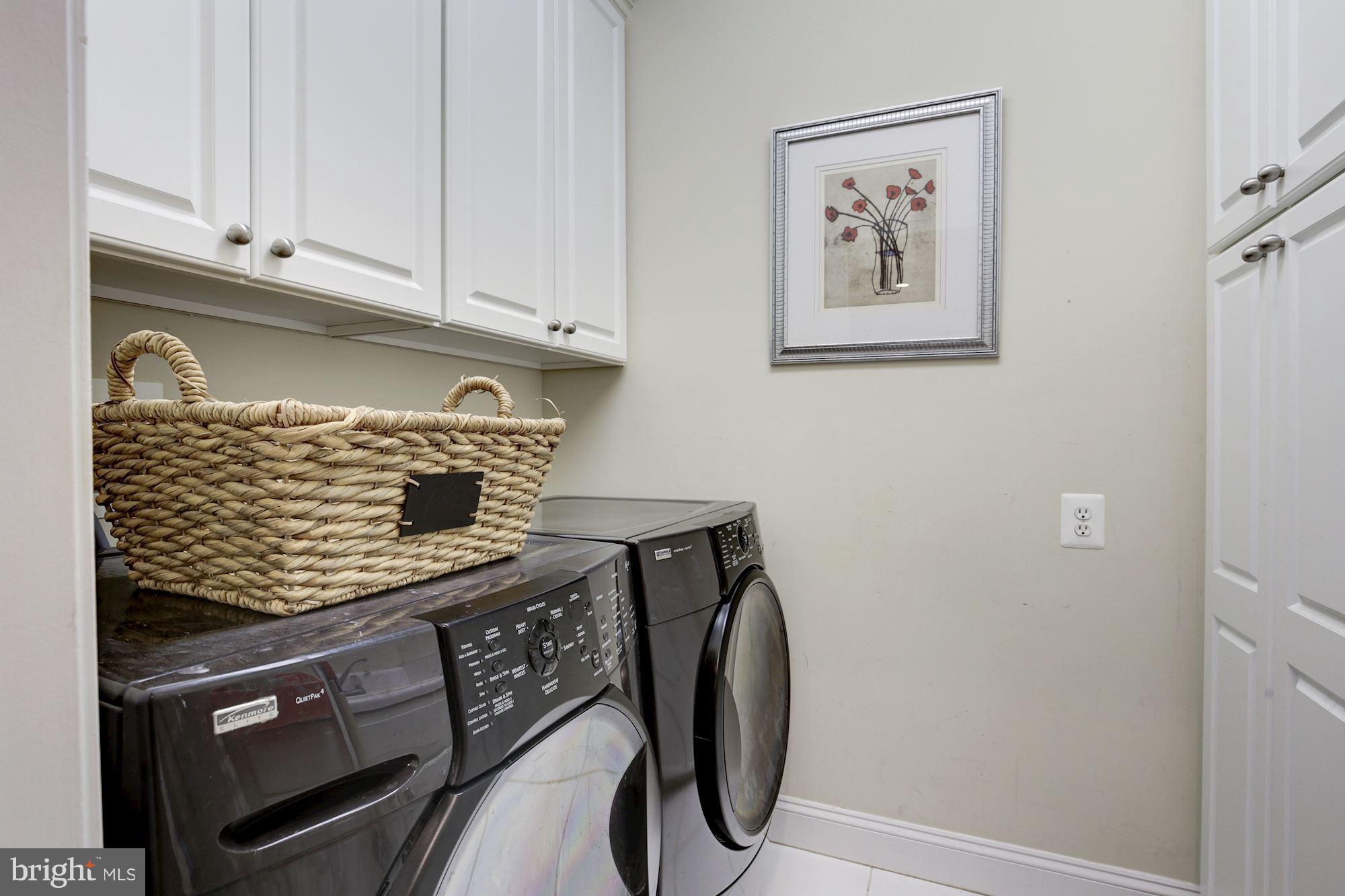 4616 Maple Avenue Bethesda, MD 20814 - Photo 16 of 30 2nd floor laundry with front load washer dryer